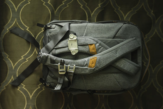 black leather handbag on black textile