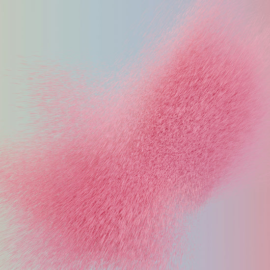 a pink substance is flying in the air