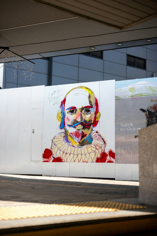 Colorful abstract portrait of a man on a wall