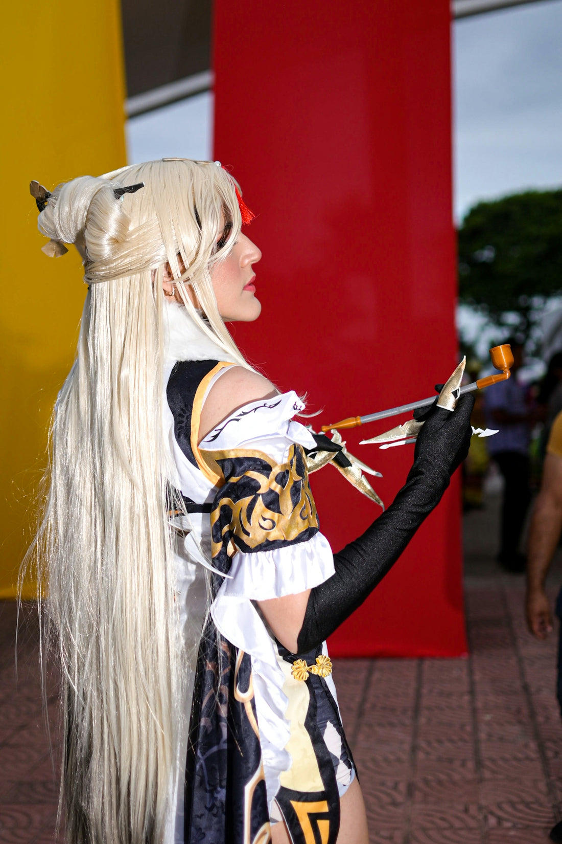 Woman in elaborate costume with long blonde hair