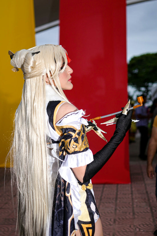 Woman in elaborate costume with long blonde hair