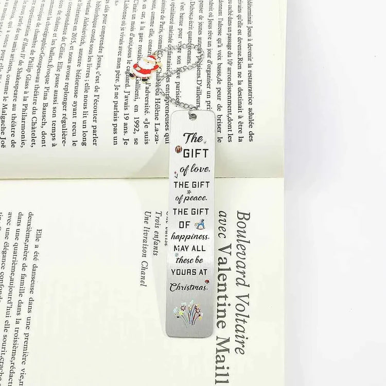 A stainless steel pendant bookmark about Christmas, the warmest Christmas reading gift for loved ones on Christmas Eve. by DSERS