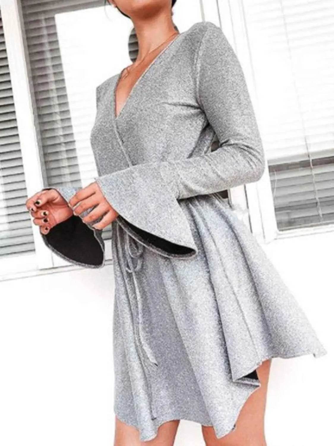 Ivy Lane Plus Size Surplice Neck Flare Sleeve Dress women Attire by Trendsi