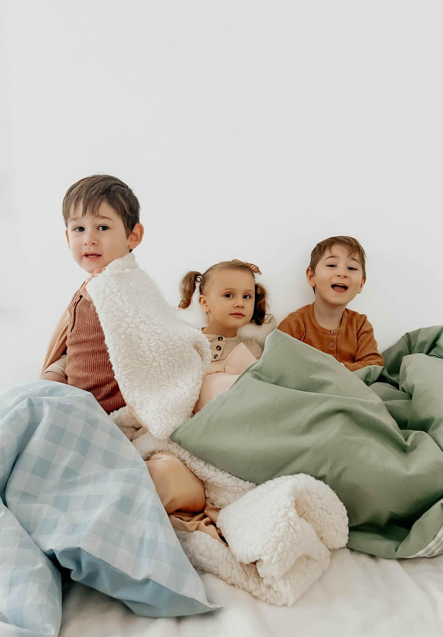 Marine Gingham Quilted Blanket by Little Mae & Co