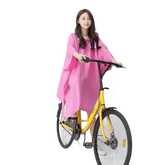 Woman in Colorful Waterproof Long Raincoat on Yellow Bicycle Raincoat by Lemonkid Hat Slipper Raincoat Store